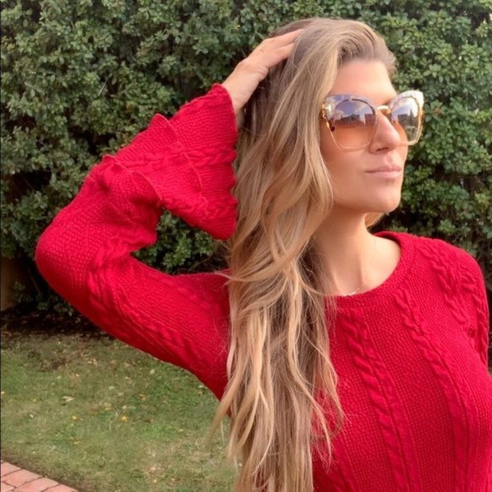 Red cable knit bell sleeve sweater